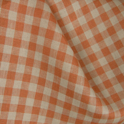 Tissu 100% lin à carreaux beige et orange.