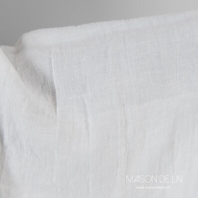 Tissu lin lave blanc casse solid.
