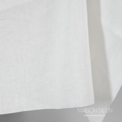 Tissu lin blanc casse.