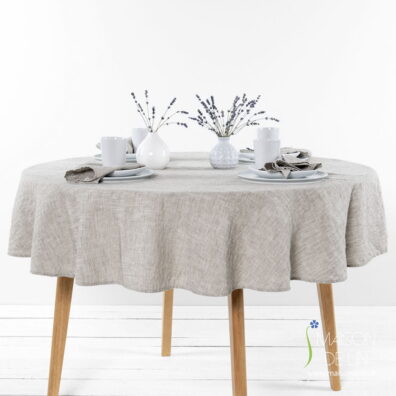 Nappe ronde de lin-coton lavé en couleur beige.