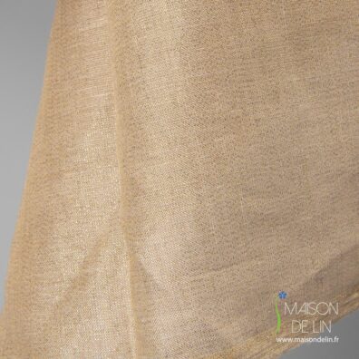 Tissu de lin avec des fils lurex d`or.