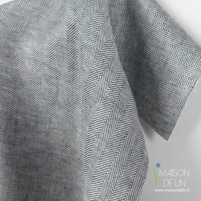 Tissu de lin dense en couleurs bleu foncé et blanc design chevron.