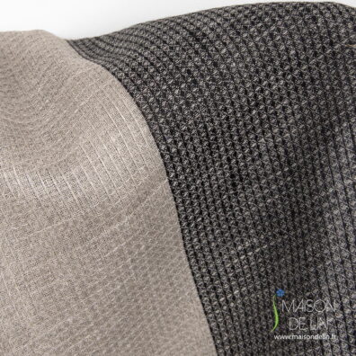 Tissu de lin étroit 50cm. largeur beige noir en un bell design gaufré.