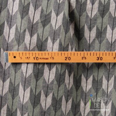 Tissu jacquard à chevron kaki et gris.