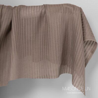 Tissu lin taupe transparent ajouré .