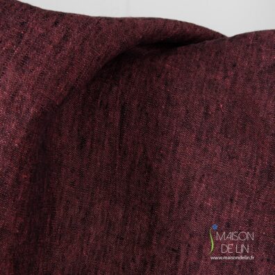 Tissu lin lave melange de noir et rose.