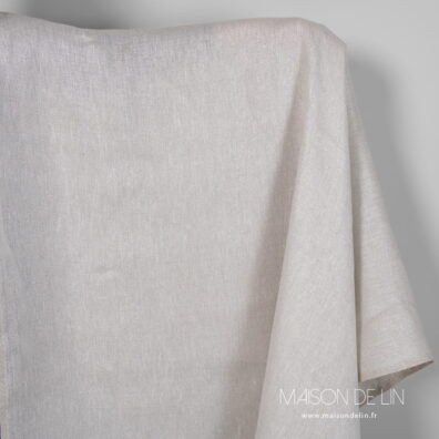 Tissus lin lurex en couleur gris clair en design très délicate de rhombes.